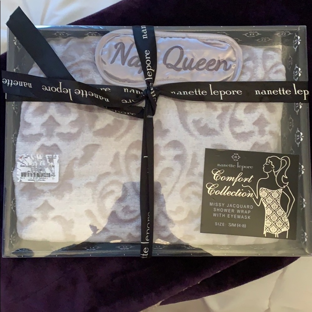 Brand new shower wrap and sleep mask